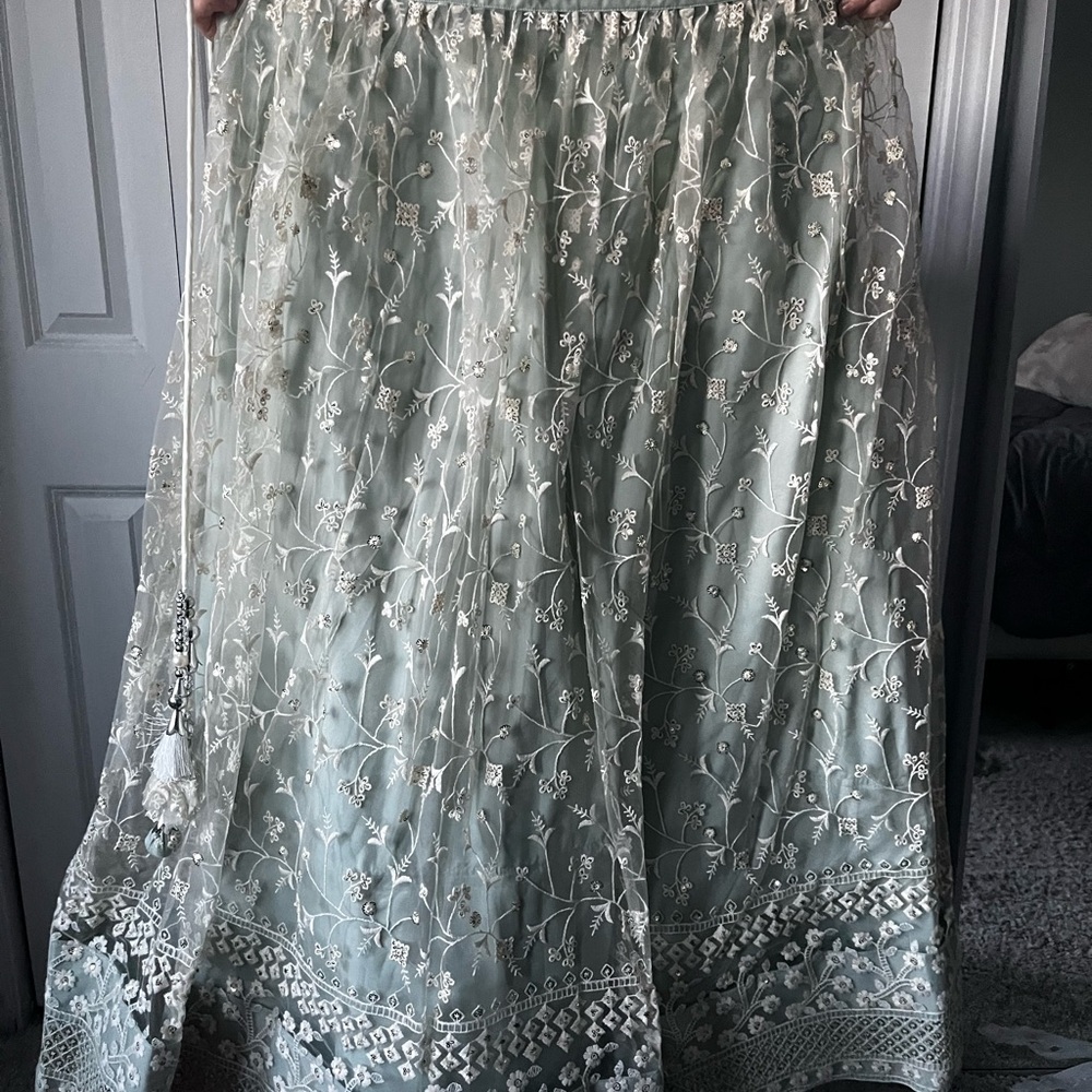 Turquoise Net Embroidered Lehenga Choli - Picture 6 of 9